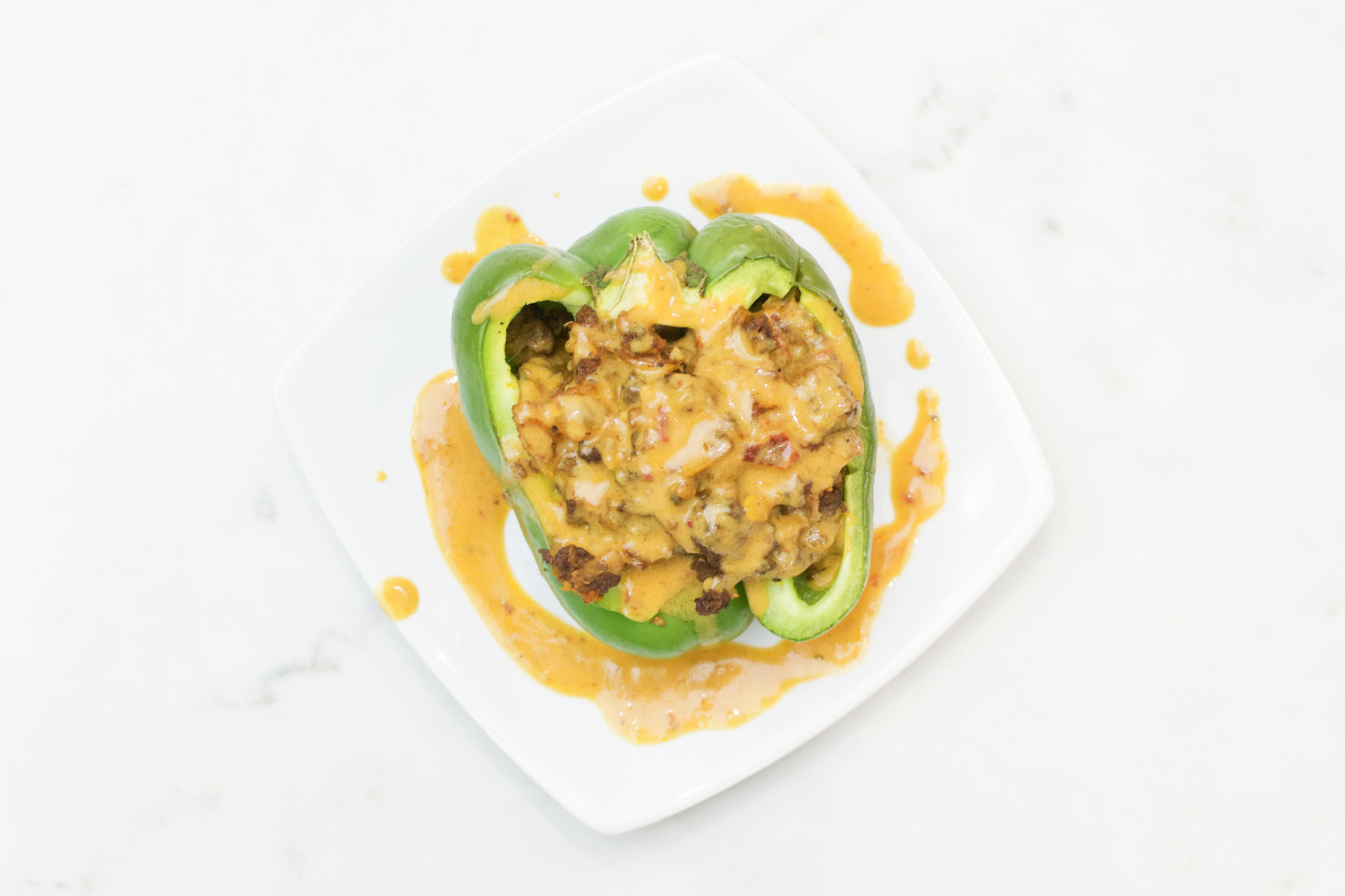 Sweet and Smoky Stuffed Peppers With Creamy Chipotle Sauce